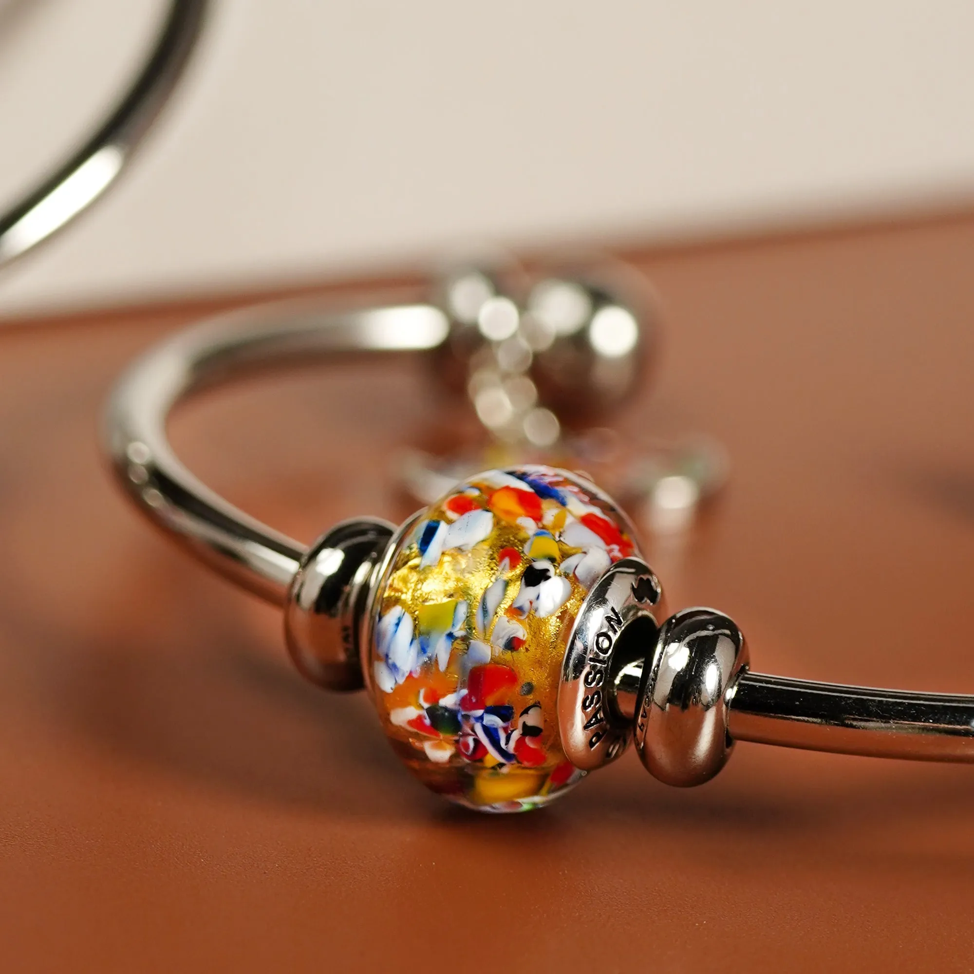 The Kiss Charm Bangle