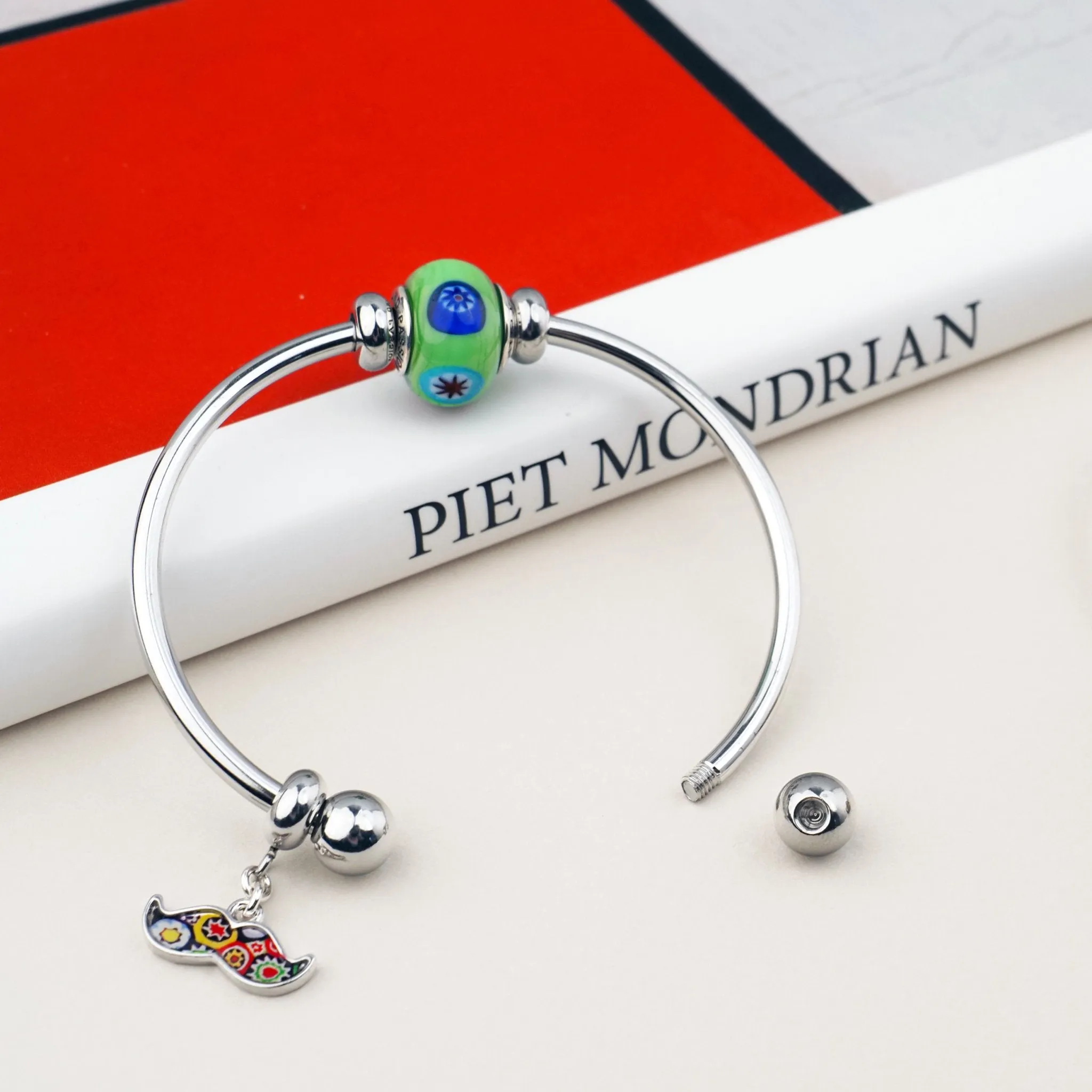 The Kiss Charm Bangle