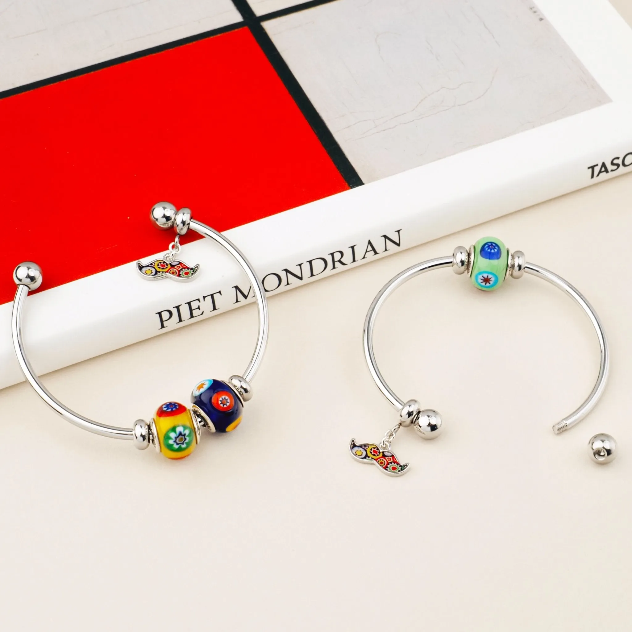 The Kiss Charm Bangle